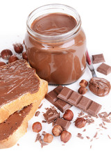 Sweet chocolate cream in jar isolated on white