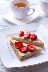 Fresh toast with  homemade butter and fresh strawberry