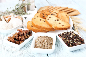 Homemade croutons on table in kitchen, close up