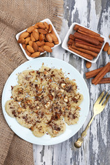 Sweetened fried banana on plate, close-up