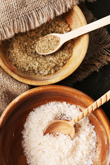 Different sea salt in bowls, close up