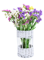 Beautiful bouquet of bright flowers in vase isolated on white