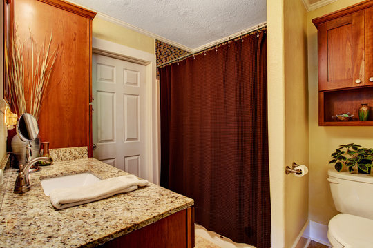 Bathroom interior with granite top cabinet