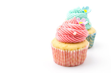 Vanilla cupcakes isolated white background