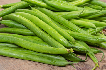Fresh green beans on table