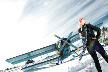 Naklejka premium girl and plane winter