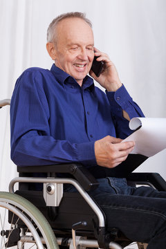 Disabled man talking on phone