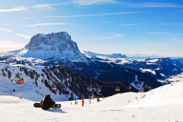 ski lift and view of Dolomites mountains, Italy