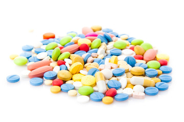  Pile of various colorful pills isolated on white