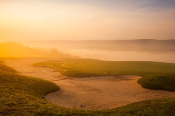 Great view at the beautiful golf course in the morning mist