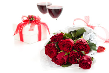 Roses and gift. Isolated on white background.