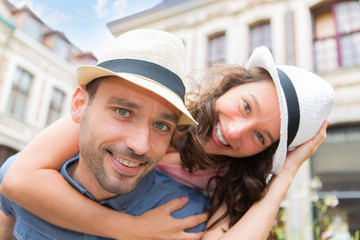 Obraz premium Young happy couple having fun on holidays