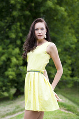 Beautiful young woman in green dress