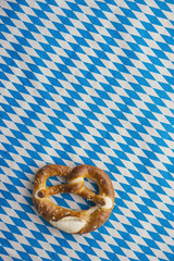 Oktoberfest: Pretzel on bavarian tablecloth