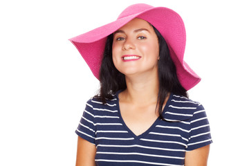 Young beautiful woman in a summer hat