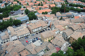 Fototapeta na wymiar Piazza grande and church of the Suffrage on Borgo Maggiore