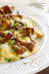 Traditional scrambled eggs with fresh chanterelle