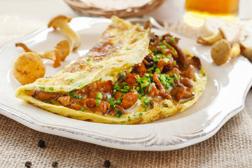 Traditional scrambled eggs with fresh chanterelle