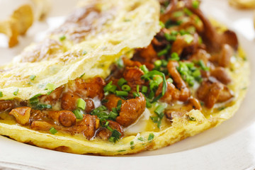 Traditional scrambled eggs with fresh chanterelle