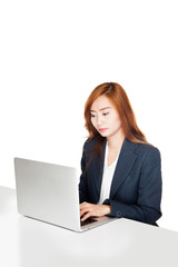 Asian office girl working on labtop