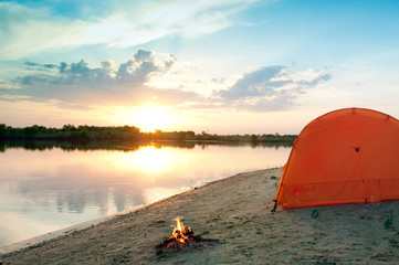 tent and campfire at night