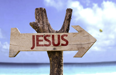 Jesus wooden sign with a beach on background - obrazy, fototapety, plakaty