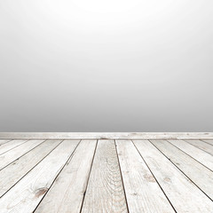 Empty room with faded wooden floor and white gray wall