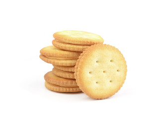 five salty crackers stacked over white