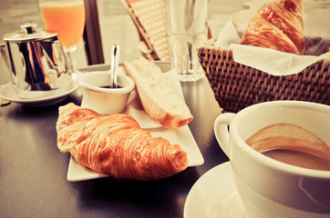 coffee and croissants on table