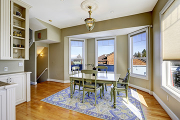 Dining room with green wooden table set