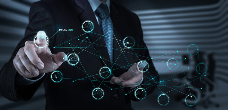 businessman hand pushing solution diagram on a touch screen inte