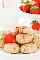 Oat bran, coconut and strawberry cookies, selective focus