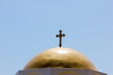 Fototapeta na wymiar rood top of a church with cross