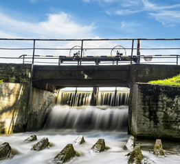 Water gate in the system of lakes in Peterhof on a sunny day