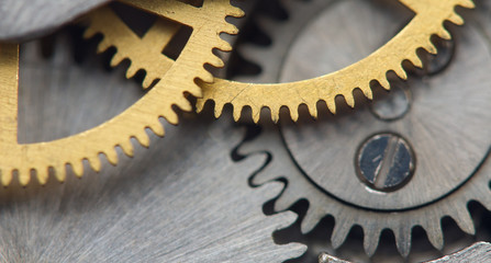 Metallic Background with metal cogwheels a clockwork. Macro