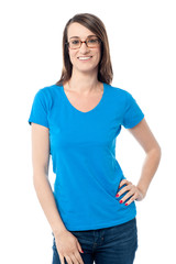 Obraz premium Smiling woman with hands on hips