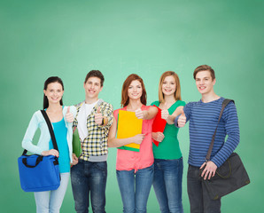 Fototapeta na wymiar group of smiling students standing