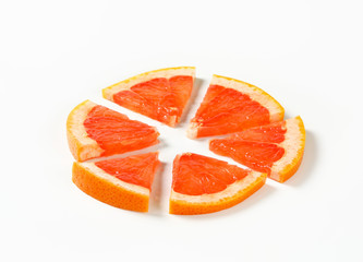 Obraz na płótnie Canvas Slice of red grapefruit