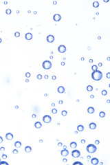 Fototapeta na wymiar Many bubbles in water close up