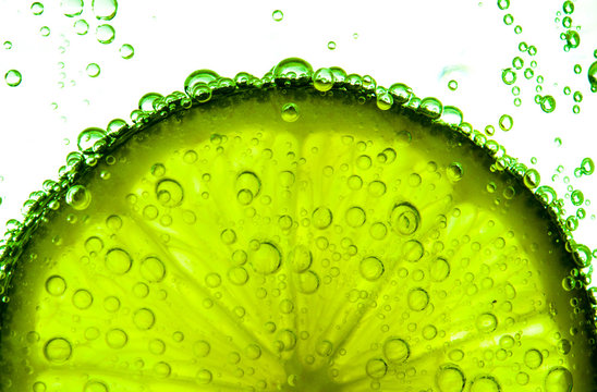 Green lime with water splash