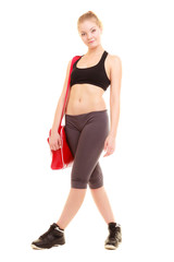 Sport. Fitness sporty girl in sportswear with gym bag