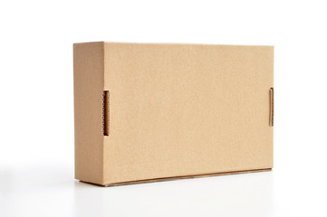 Brown cardboard box as a parcel - isolated - obrazy, fototapety, plakaty