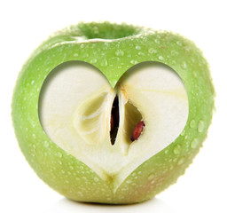 Juicy green apple with heart, isolated on white