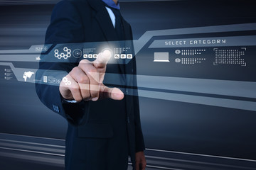 Businessman pressing virtual buttons