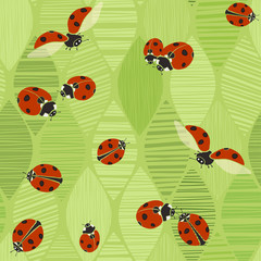 Seamless pattern with ladybugs on a background of abstract leave