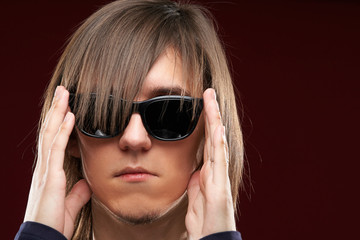 Obraz premium Portrait of a hairy man in black glasses