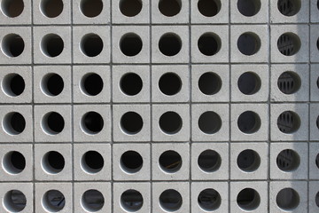 Concrete wall with holes