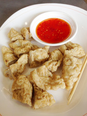 the fried fishball with sweet sauce , snack food