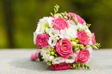 Wedding bouquet of red white roses