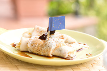Pancakes with toothpick flag